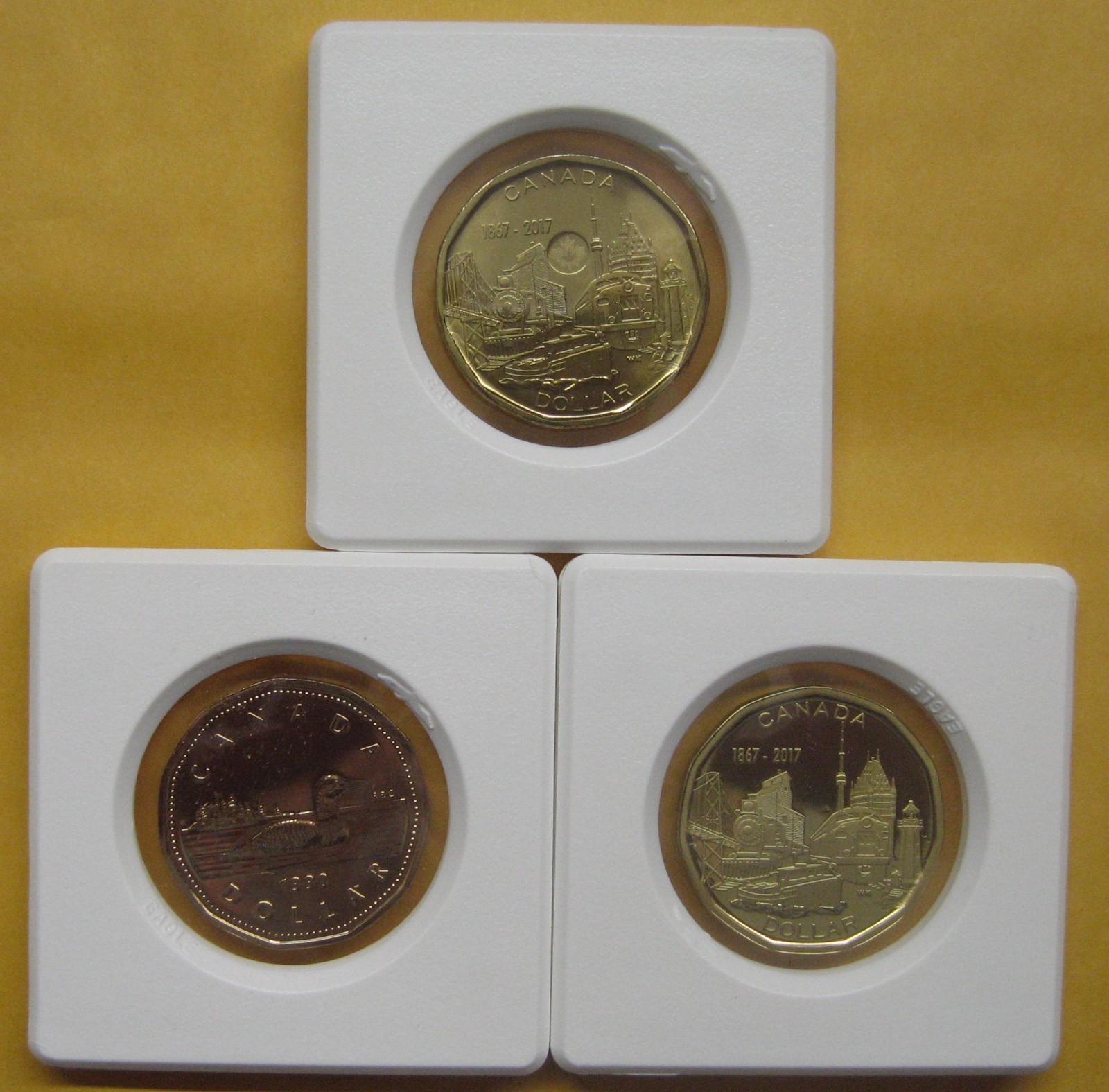 Lot of 3 Canada Dollars Take a look