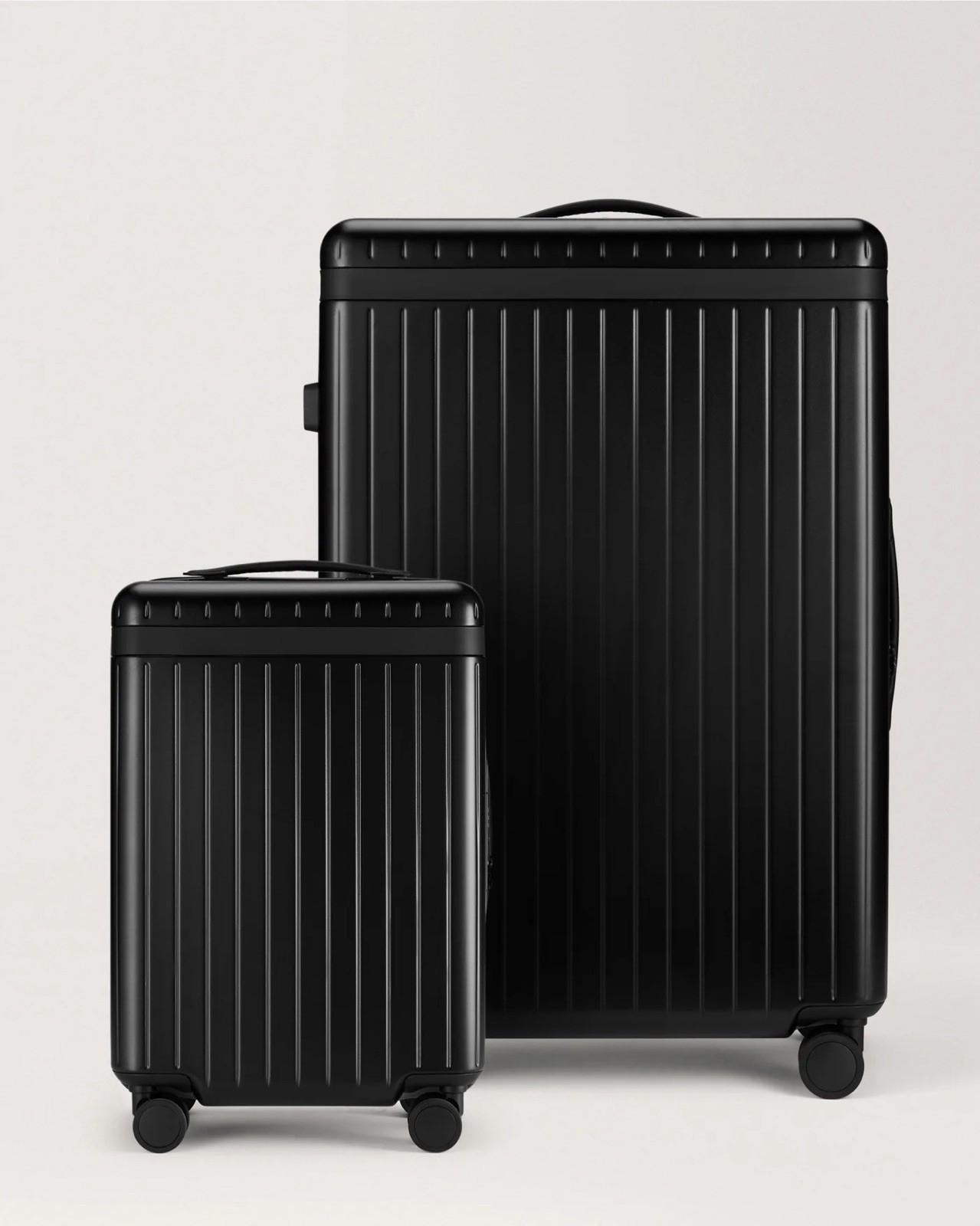 Carl Friedrik Luggage Set — Black/Black | Carry-on + Large Check-in
