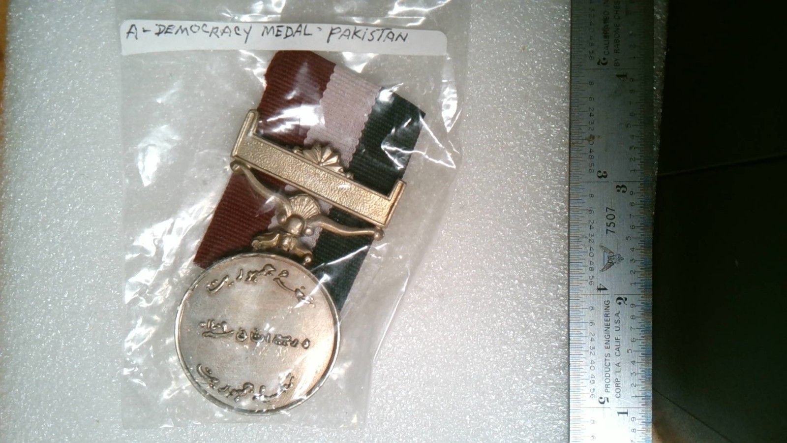 MILITARY INSIGNIA MEDAL DEMOCRACY MEDAL WRITTEN IN ARABIC PAKISTAN