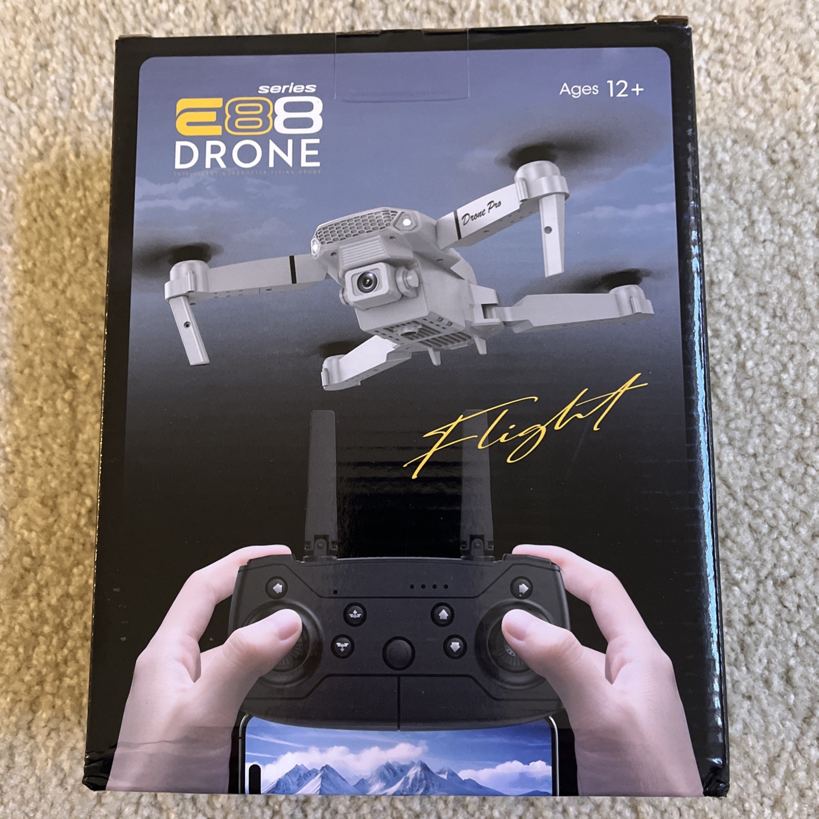 E88 Intelligent Quadcopter Flying Drone  Single Camera Black Color Age 12+ LOOK