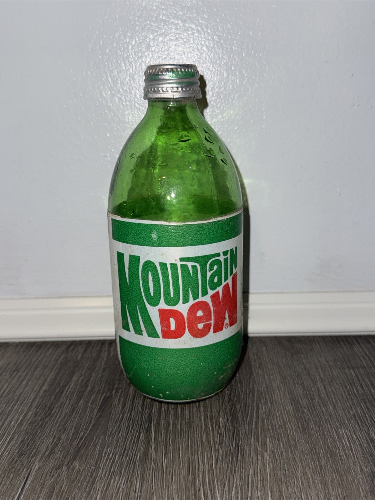 RARE 1980's  16 oz  Mountain Dew Glass Bottle with original lid Empty