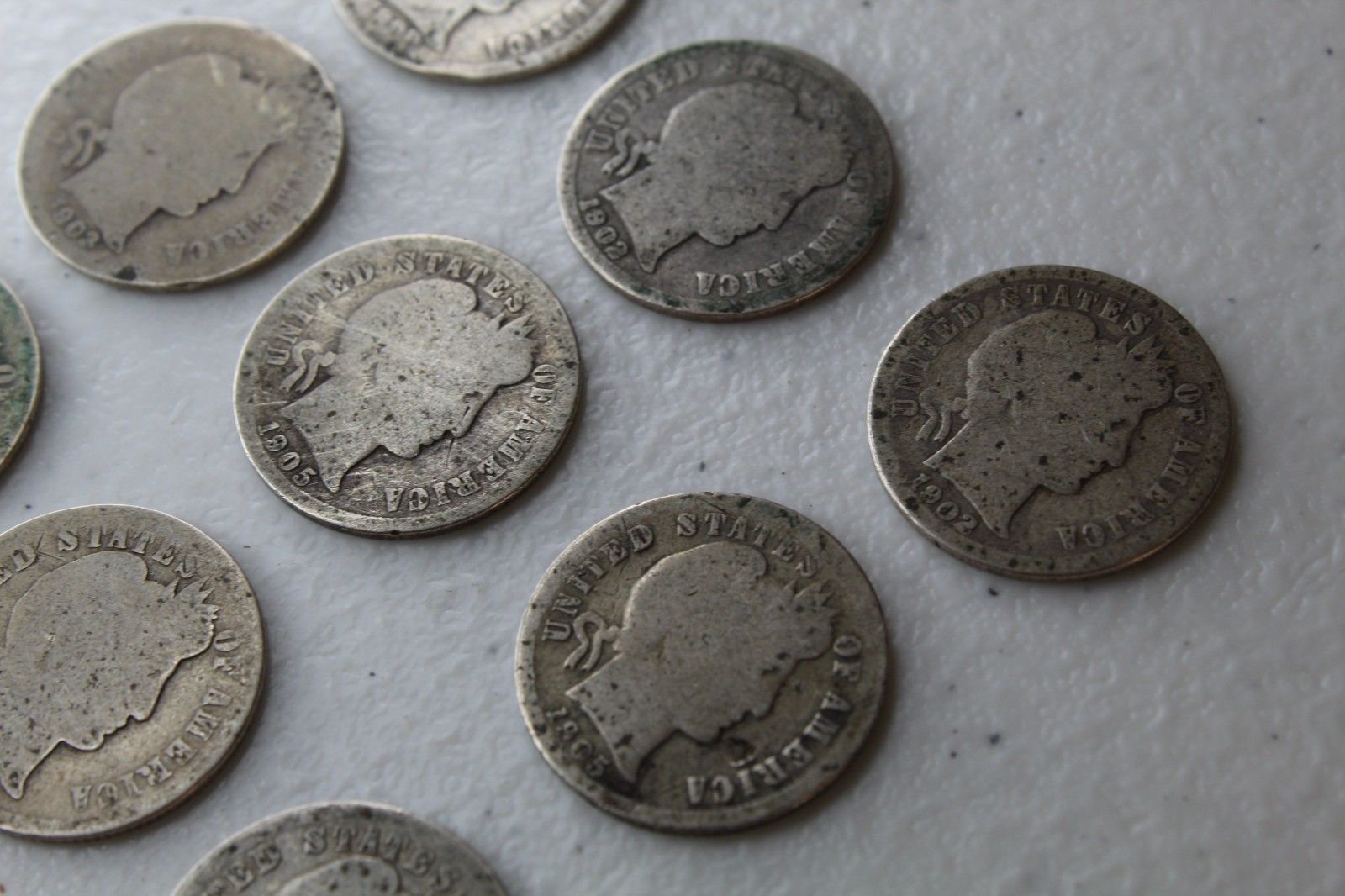 12 Very Old Very Worn Barber Dimes with dates