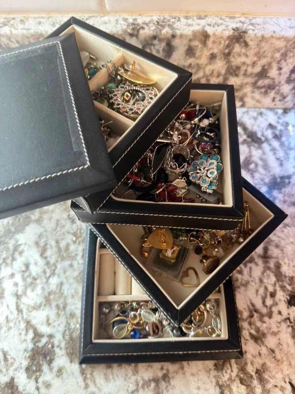 Black jewelry box with jewelry origami