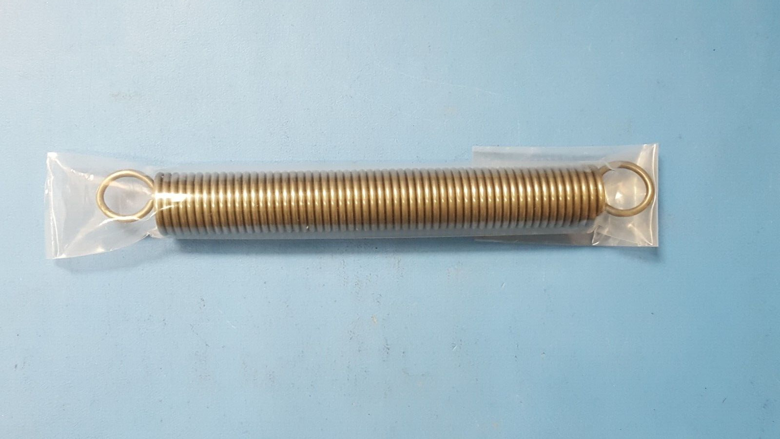 Steel Extension Spring with Loop Ends, 965k337, 7.75" Long, 0.875" OD, 0.105" WD