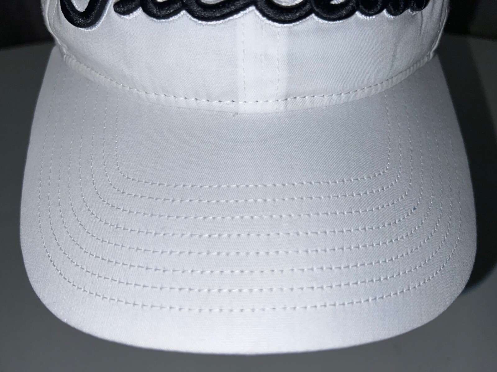 Titleist embroidered in Black on White on White Hat Cap Hook Loop Gray Band EUC
