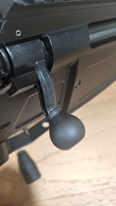 Sig Sauer Cross round bolt knob.