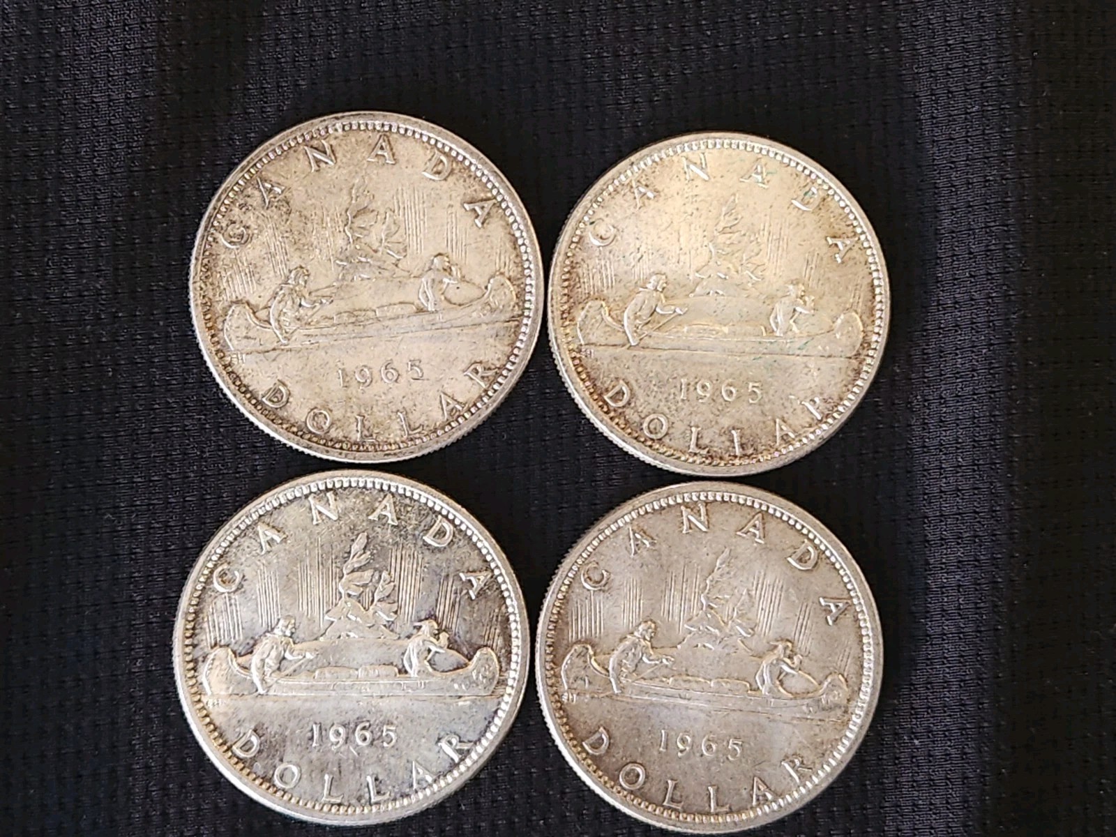 Lot of 4 Canadian Silver Dollars