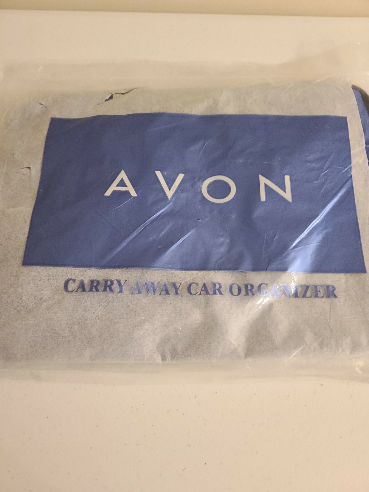 NEW IN PKG  AVON Carry Away Car Organizer BRAND NEW color-BLUE