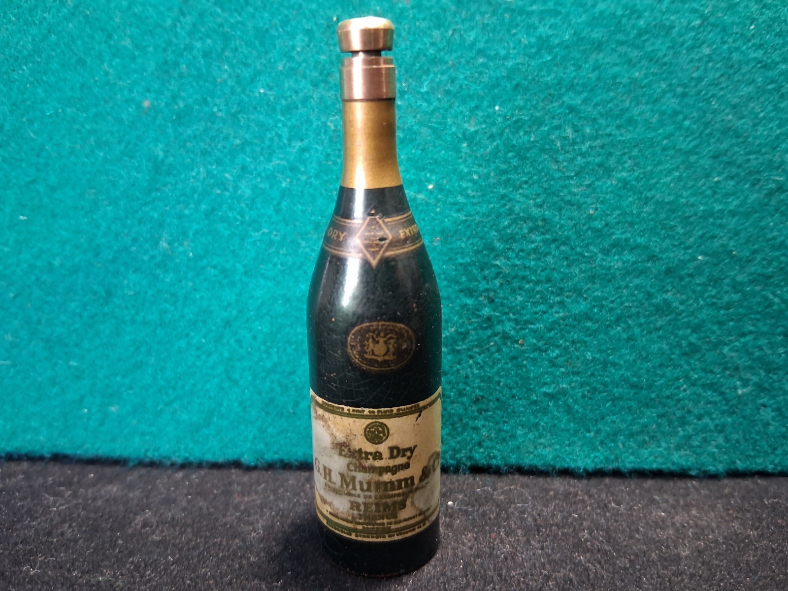 G.H.Mumm antique mini metal bottle opener. Circa 1920's. Excellent condition.