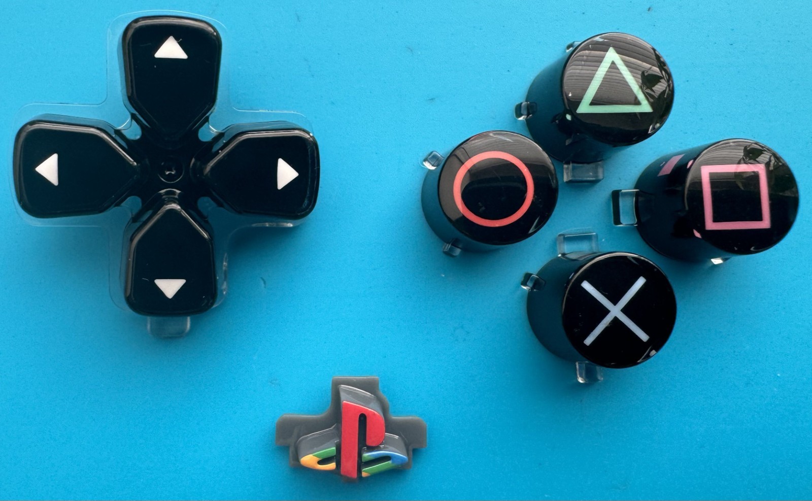 30th Anniversary PS5 6 Piece Retro  And  Glass  Button Set. PS5 Controller