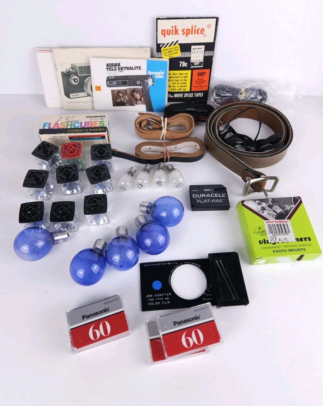 Junk Drawer Lot Of Vintage Camera Camcorder Parts - Bulbs Straps Tapes Manuals