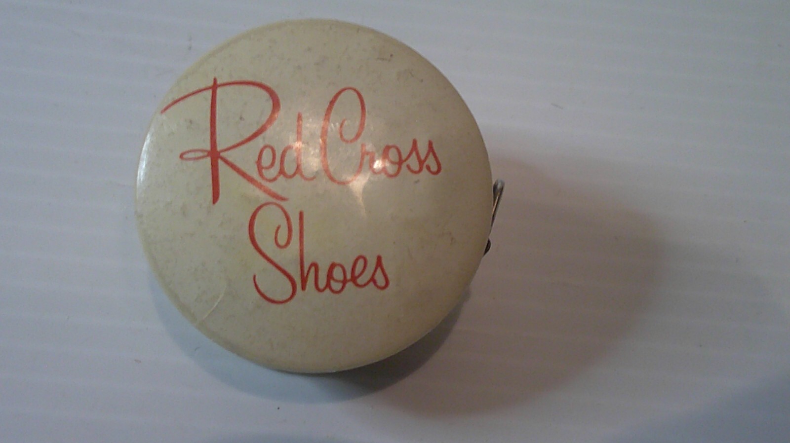 1940's advertising Red Cross shoes metal tape measure w/ cloth tape shoe on top