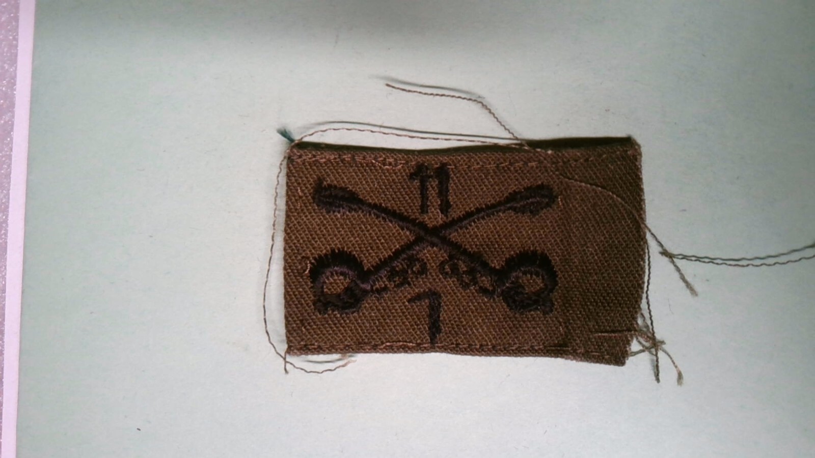 MILITARY PATCH OLDER TAB OD GREEN 1/11 IST OF THE 11TH CAVALRY REGIMENT