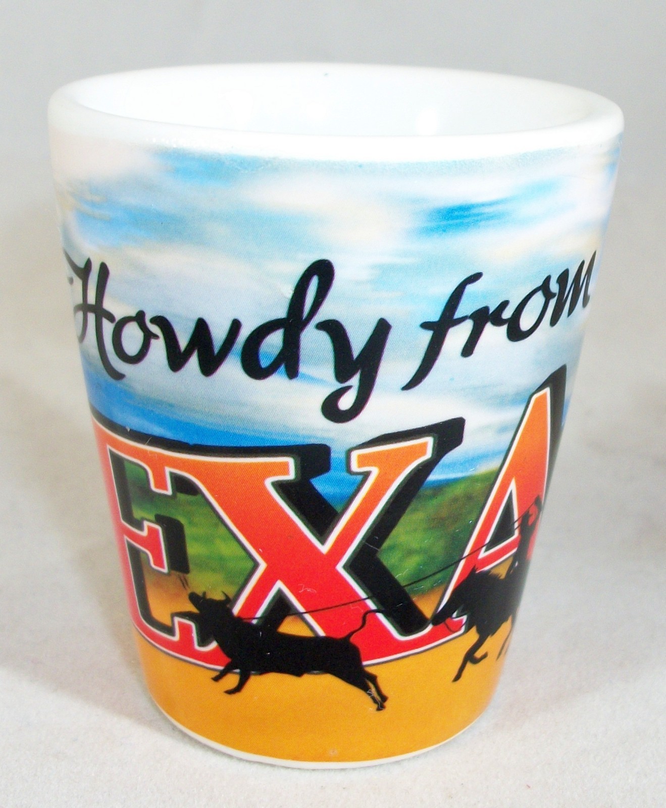 "HOWDY FROM TEXAS" Cowboys on Ceramic Shot Glass Souvenir - "Lone Star State"
