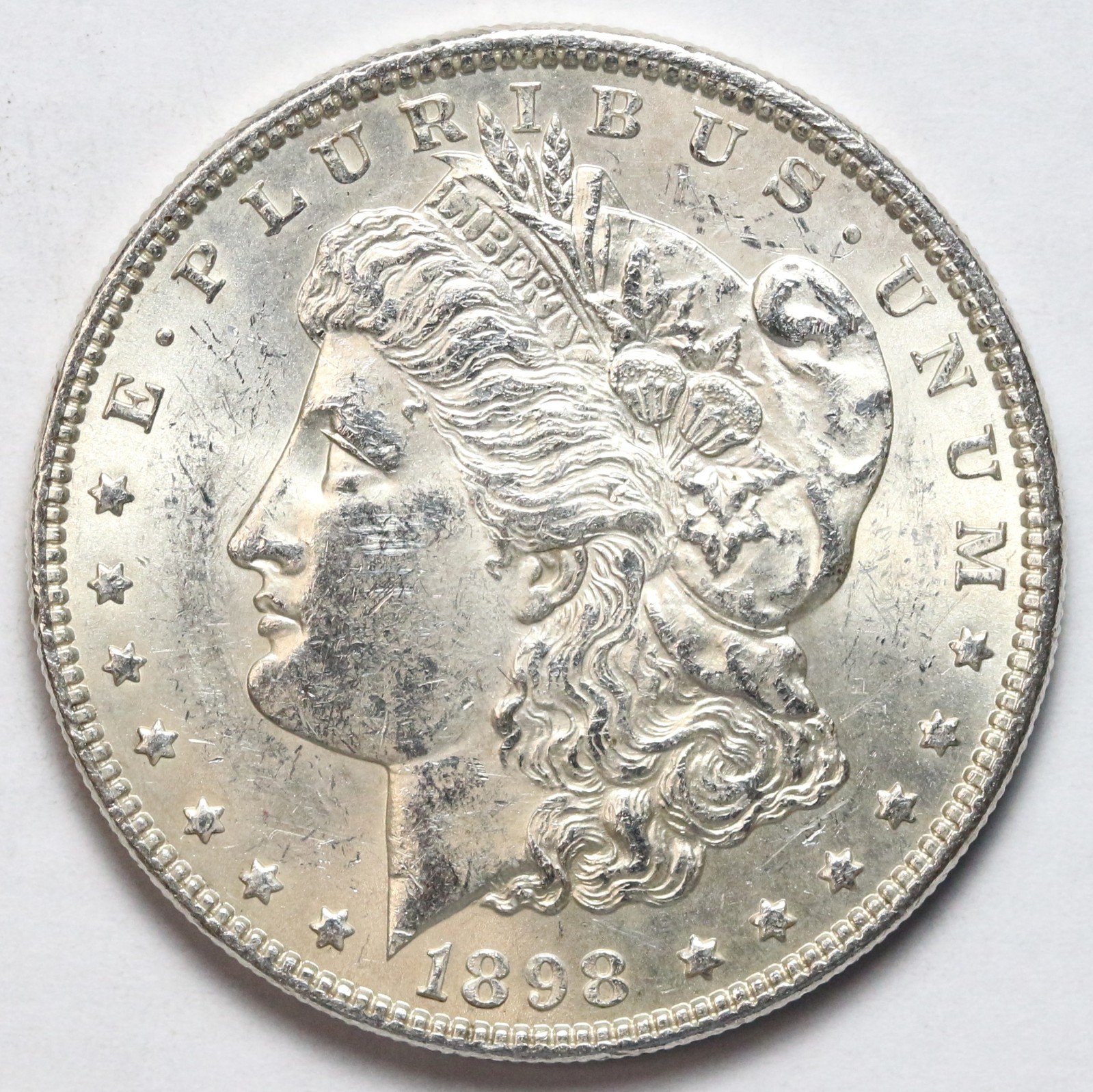 1898 $1 Morgan Silver Dollar Uncirculated - RAW - Great Luster / Lightly Toned