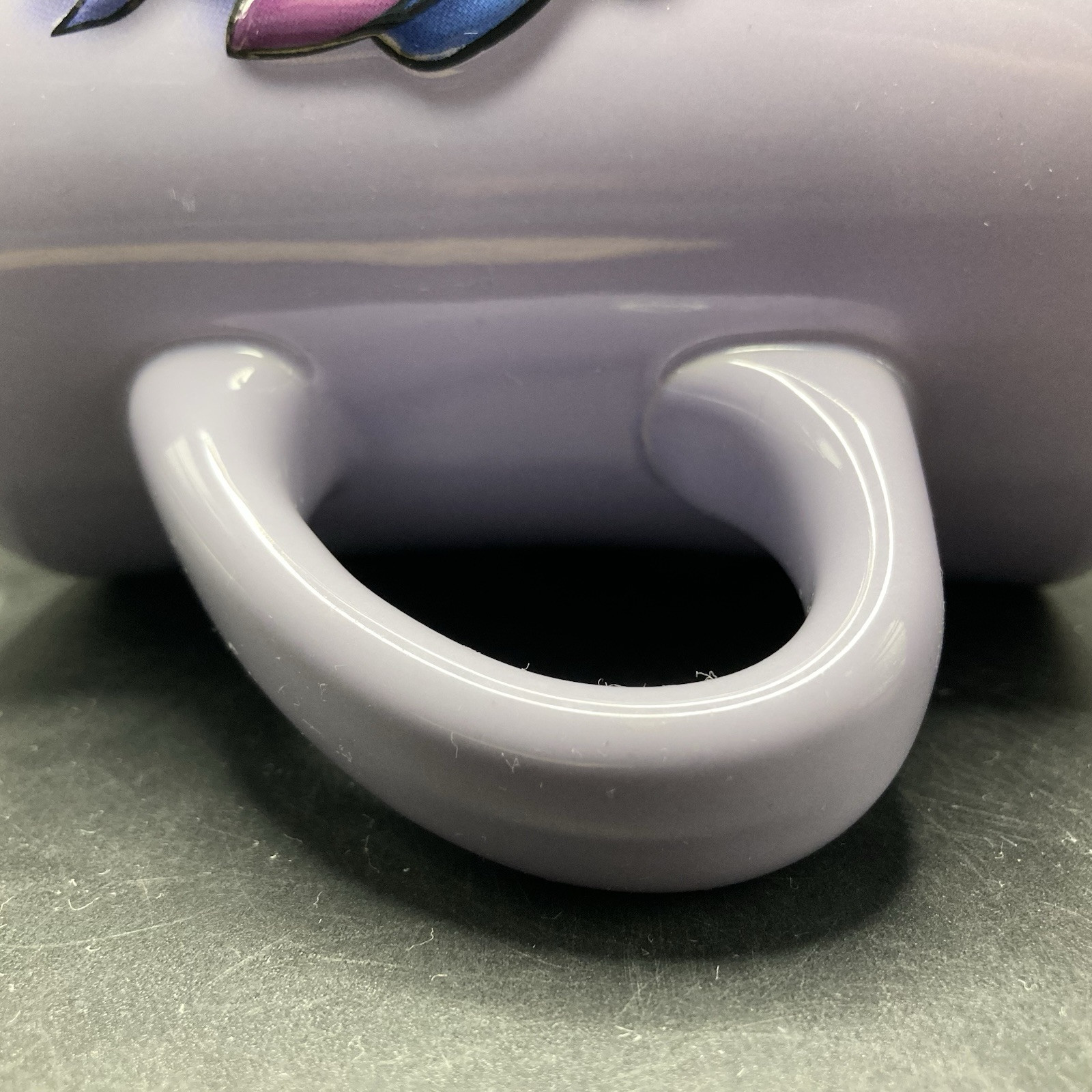 Disney Store Eeyore Bursting Through a Wall LARGE Purple Embossed Ceramic Mug