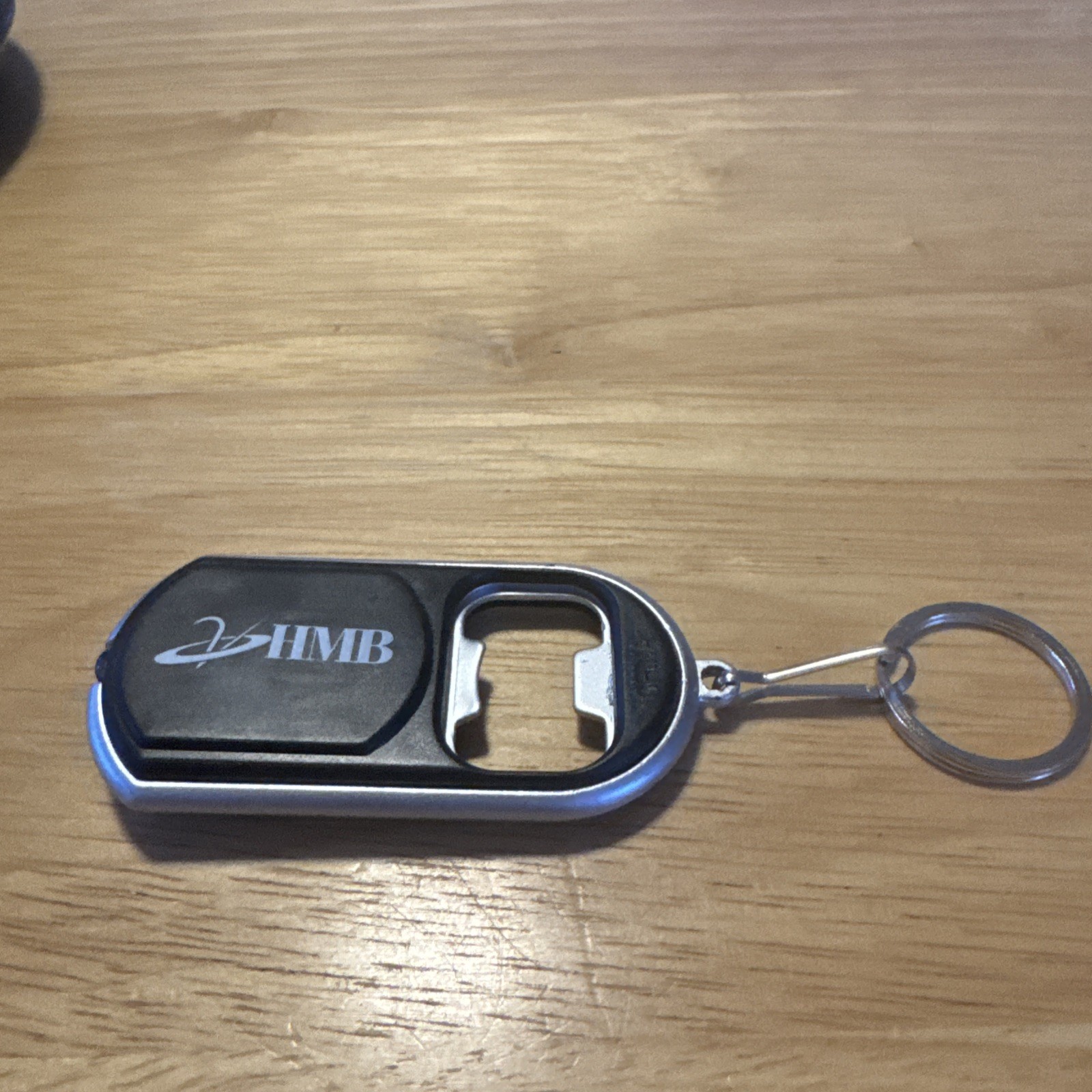 HMB Bottle Opener Keychain Flashlight works