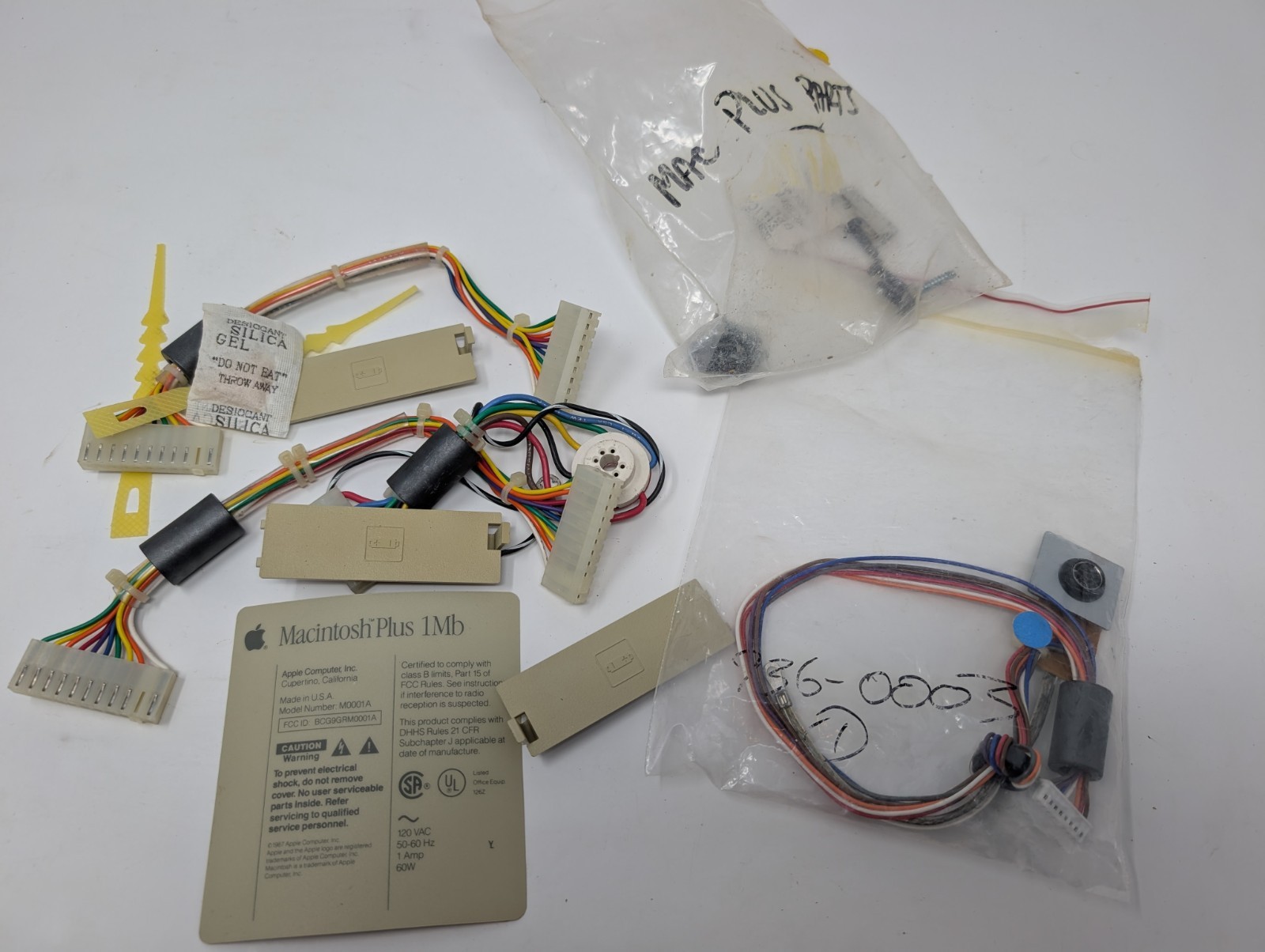 Assorted Mac Plus Parts (Cables, bezels, and whatnot)