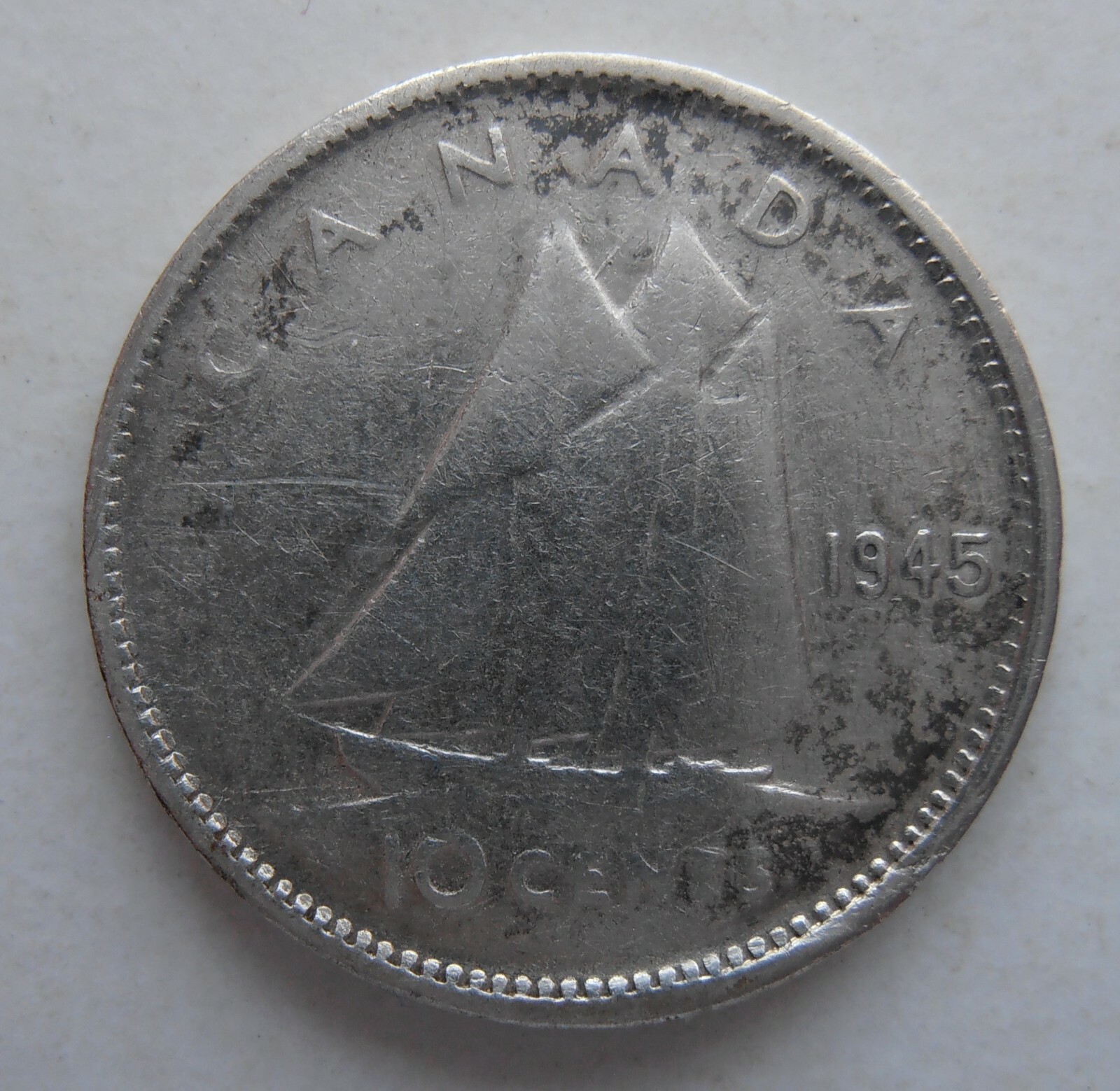 CANADA SILVER 10 CENTS 1945 SLIGHTLY BENT