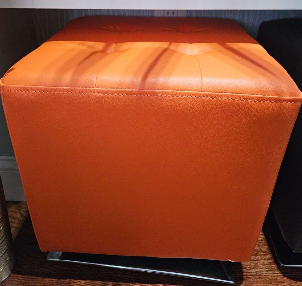 Sunpan swivel ottoman in orange