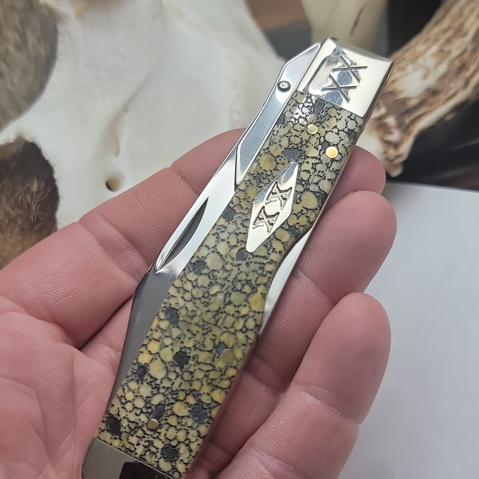 "Case XX 6111 1/2 L SS Scrolled XX bolsters Cheetah 1 of 500 Lizard Skin