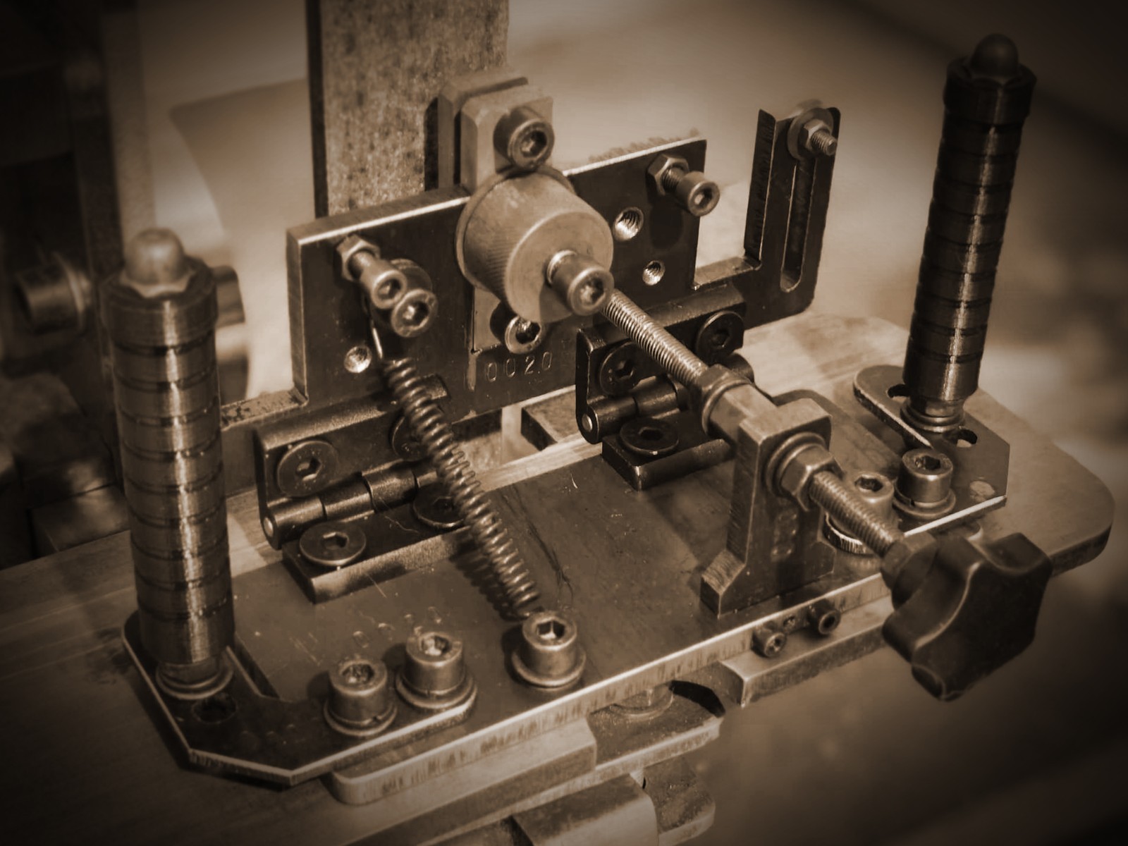 Three position Knife bevel grinding jig.