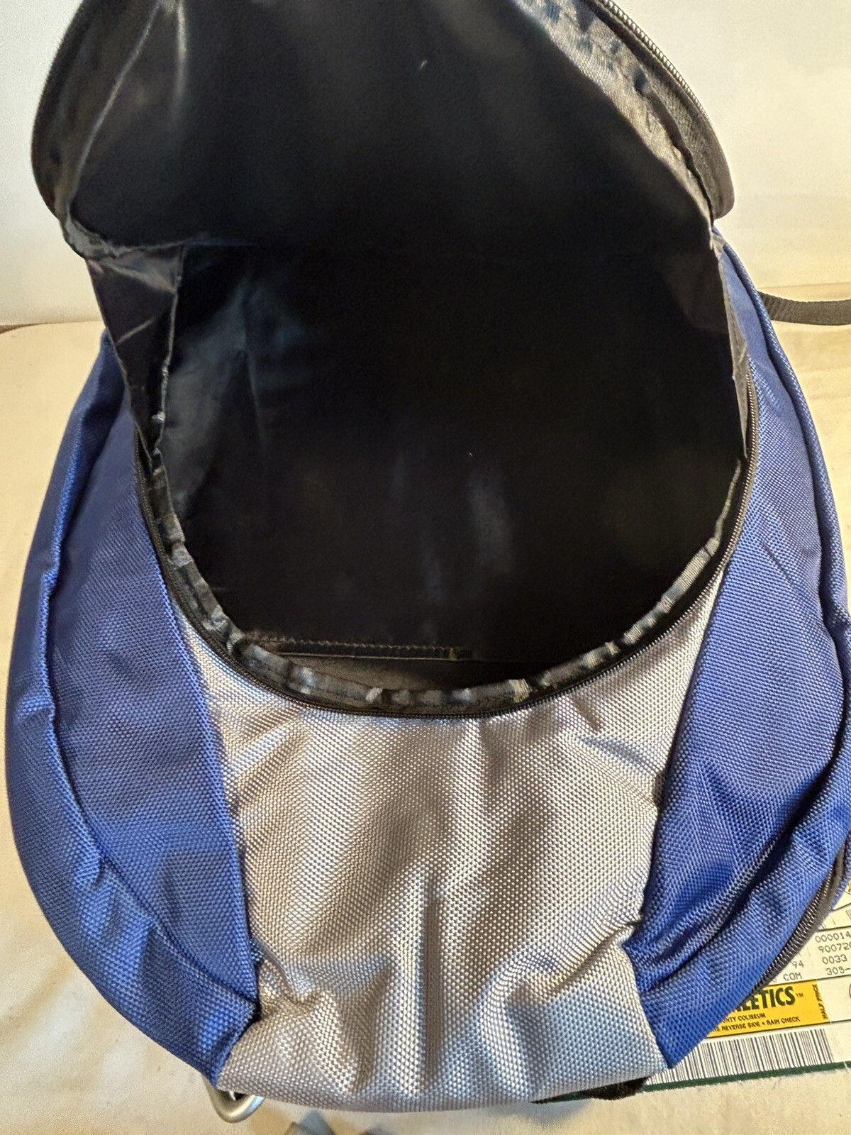 Blue/Grey NGG Swiss Edition Backpack with blue water bottle computer school