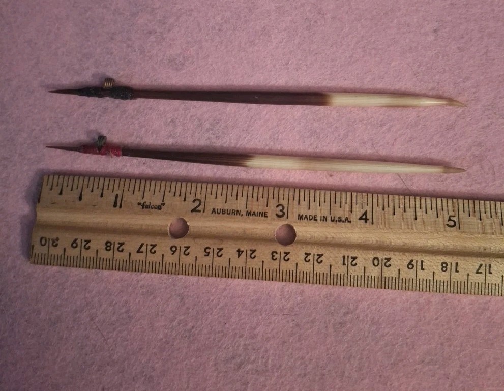 TWO HANDCRAFTED PORCUPINE QUILL FLOATS