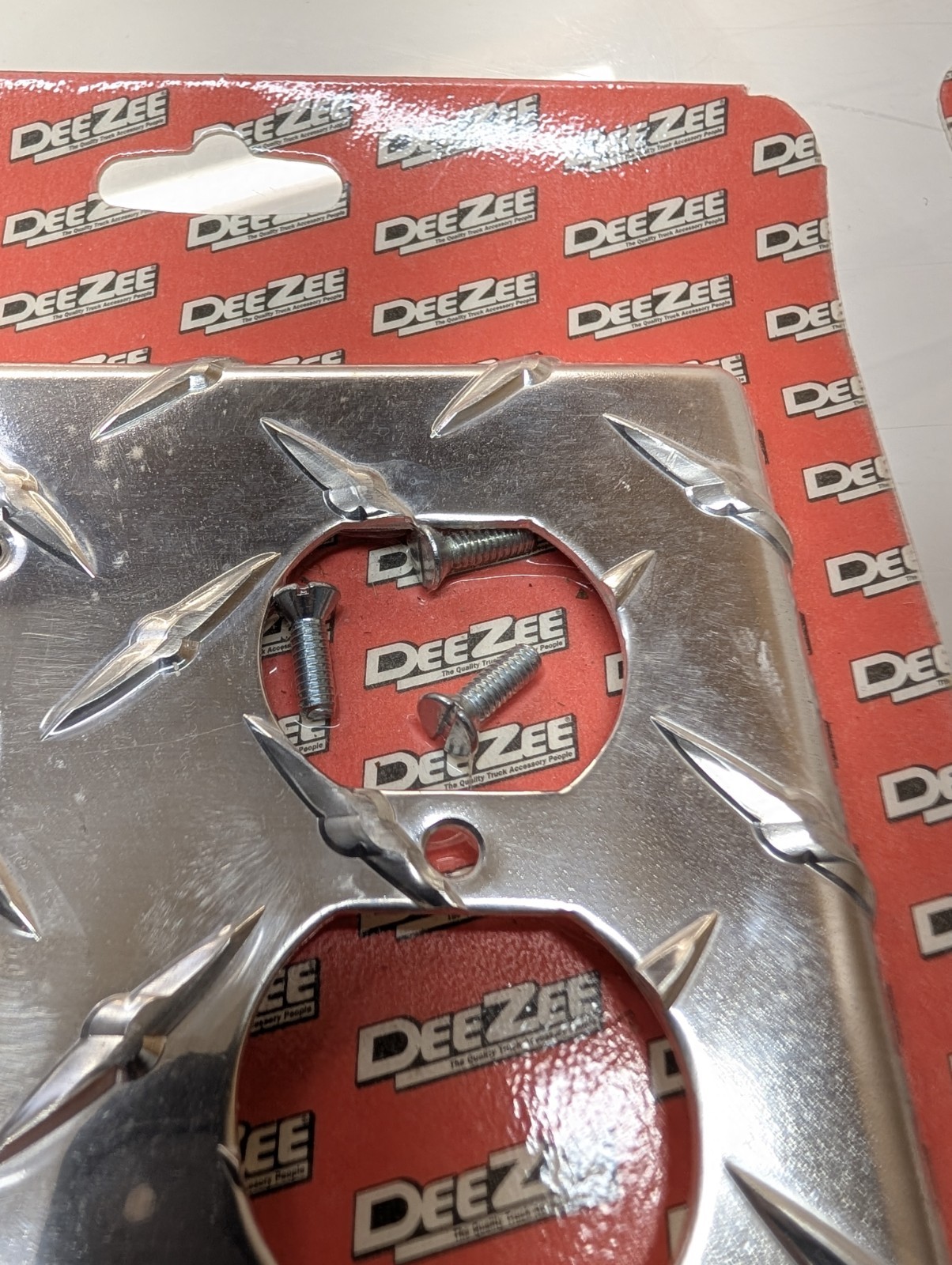 2 PCs DeeZee Brite Tread Outlet Cover. New Unopened Damaged Package