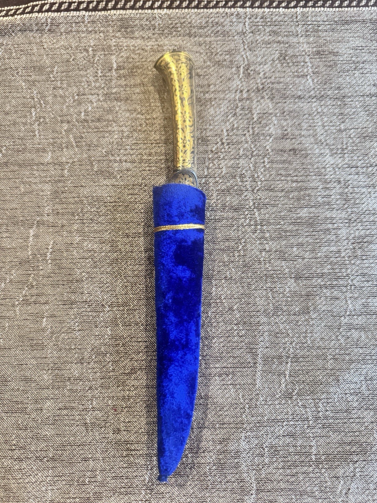 antique pesh-kabz dagger gold handle with blue sheath. wootz blade
