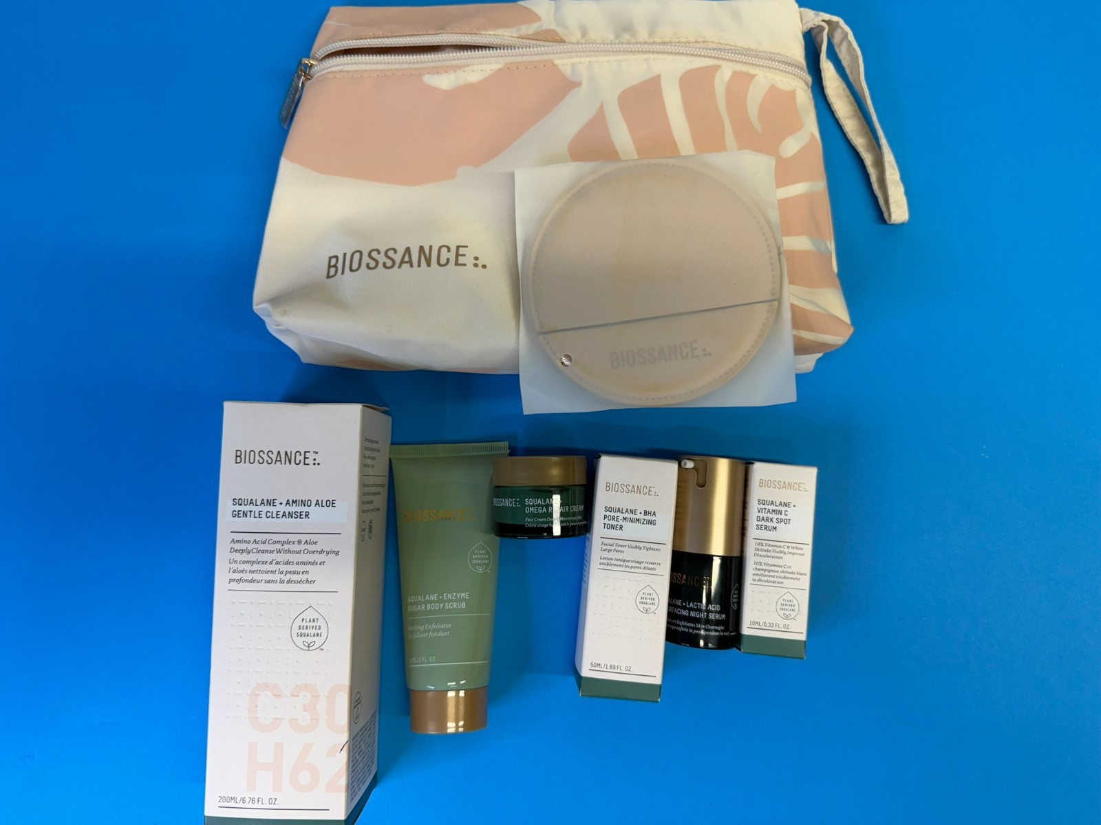 NIB Biossance 7 pc Skincare Travel Bag / Kit - Cleanser/Scrub/Repair/Serum/more