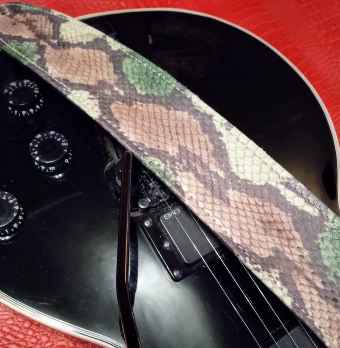 Genuine python snakeskin guitar strap with enhanced Camouflage Colors.