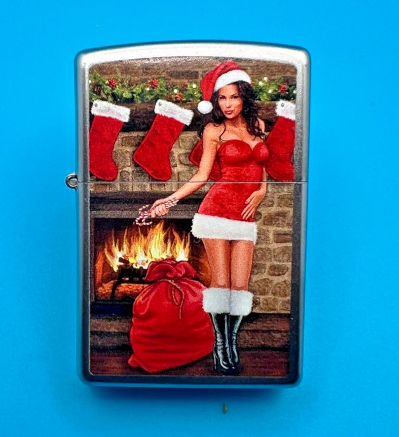 Genuine Brand New 2017 ZIPPO Lighter PULLING A CRACKER BY THE FIRE Satin Chrome