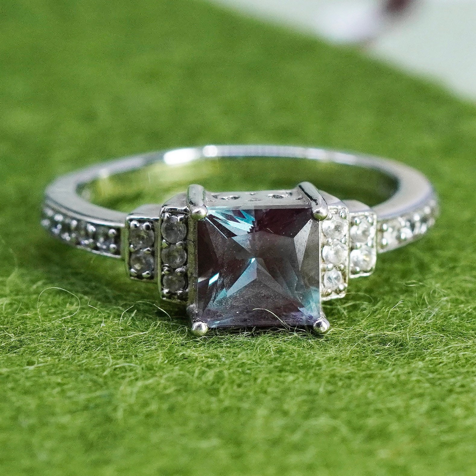 Size 9.25, vintage 925 Sterling silver ring with topaz and cz around