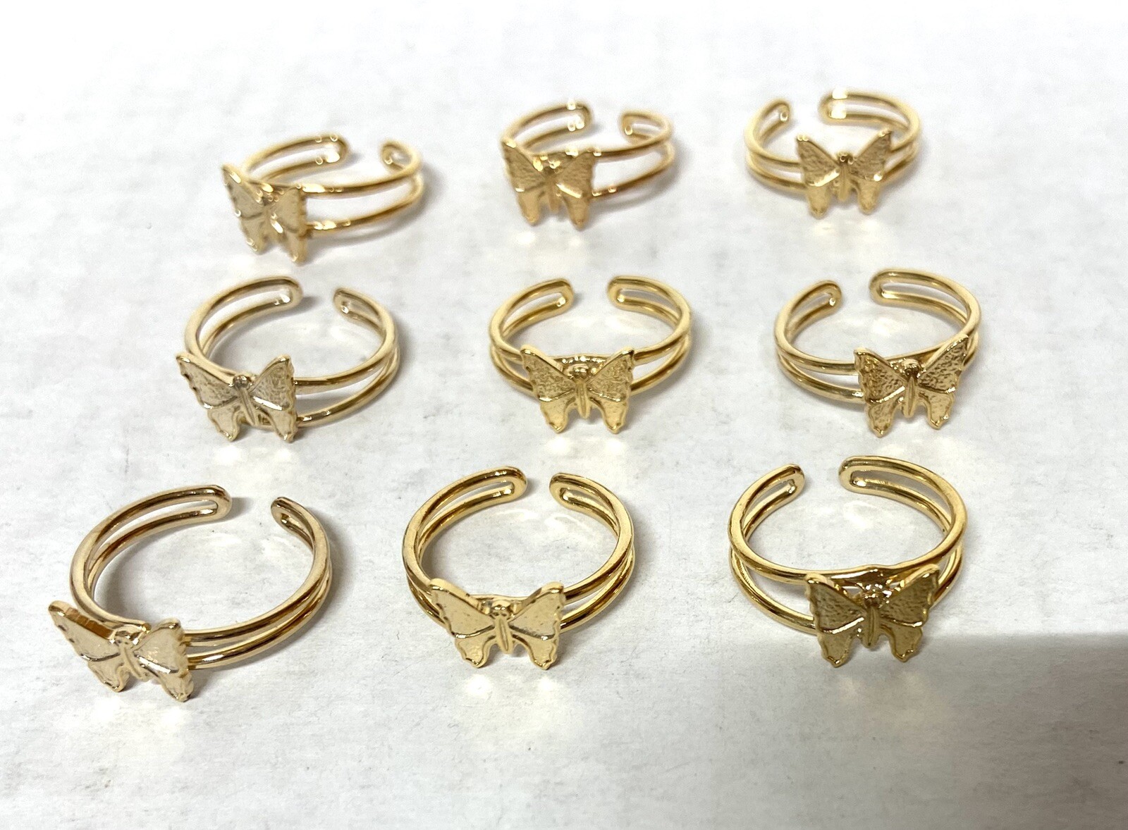 24x Gold Plate Ring with Butterfly design- one size fits most- wholesale lot