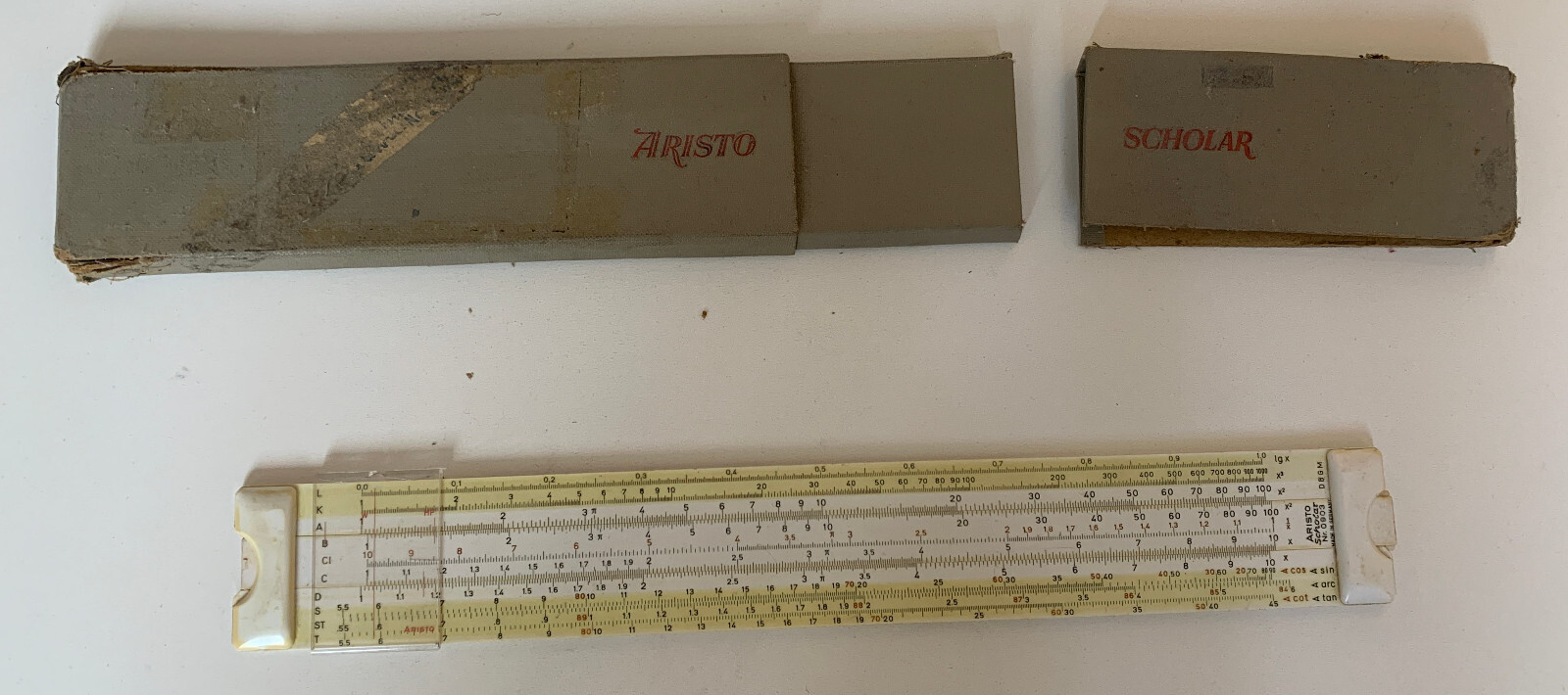 Aristo Scholar slide rule 0903 made in Germany with tatty sleeve, Midhurst GU29