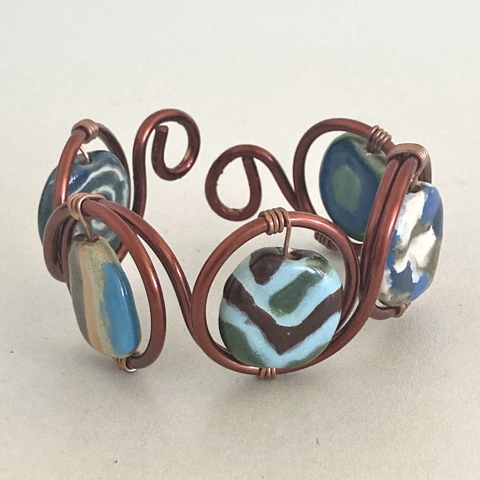 Handcrafted Copper tone Wire preloved Bracelet with Blue Green Ceramic Beads