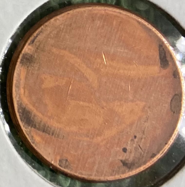 BLANK UN-STRUCK UNCIRCULATED LINCOLN CENT - MINT ERROR - IN HOLDER