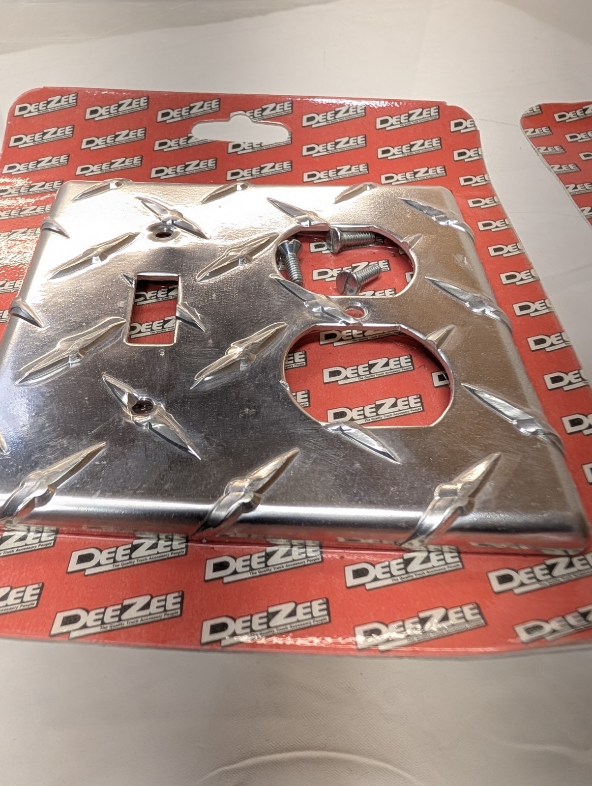 2 PCs DeeZee Brite Tread Outlet Cover. New Unopened Damaged Package