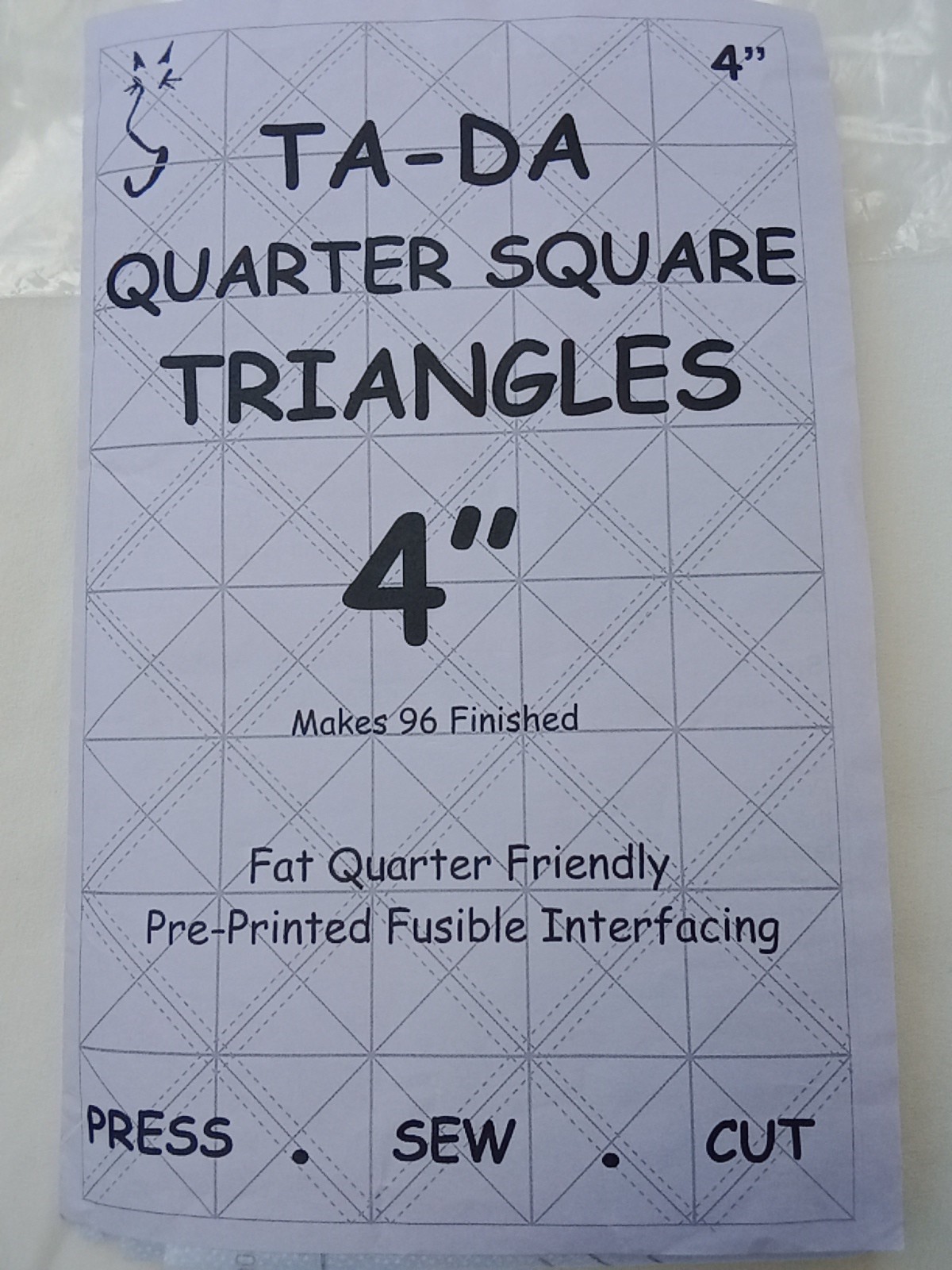 Ta-Da quarter square triangle pre-printed fusible interfacing makes 96 4" QSTs