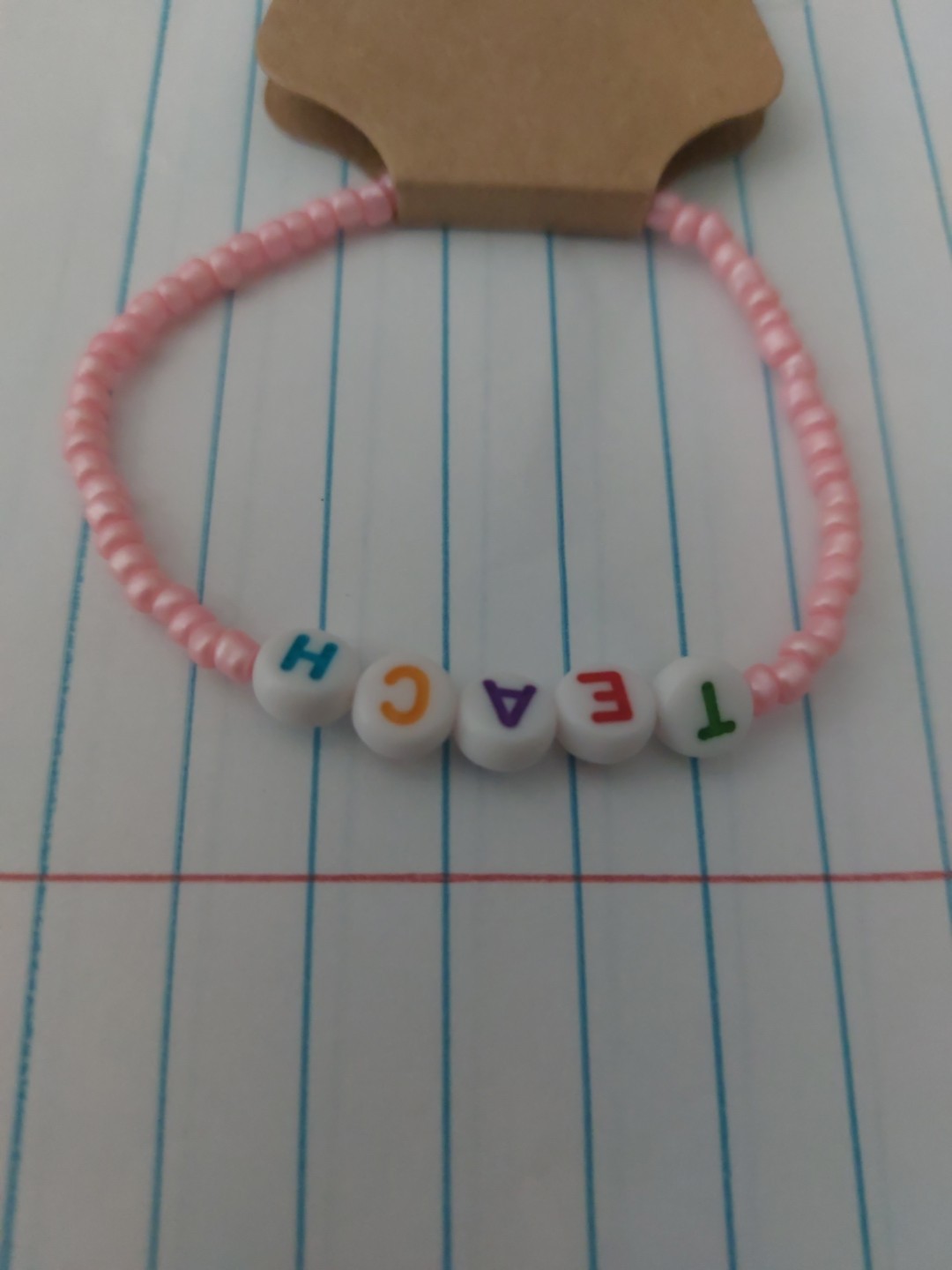 Handmade Pink "Teach" Bracelet