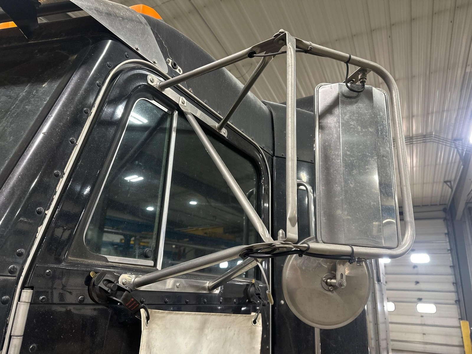 1987-2005 Peterbilt 378 STAINLESS Left/Driver Door Mirror - Used