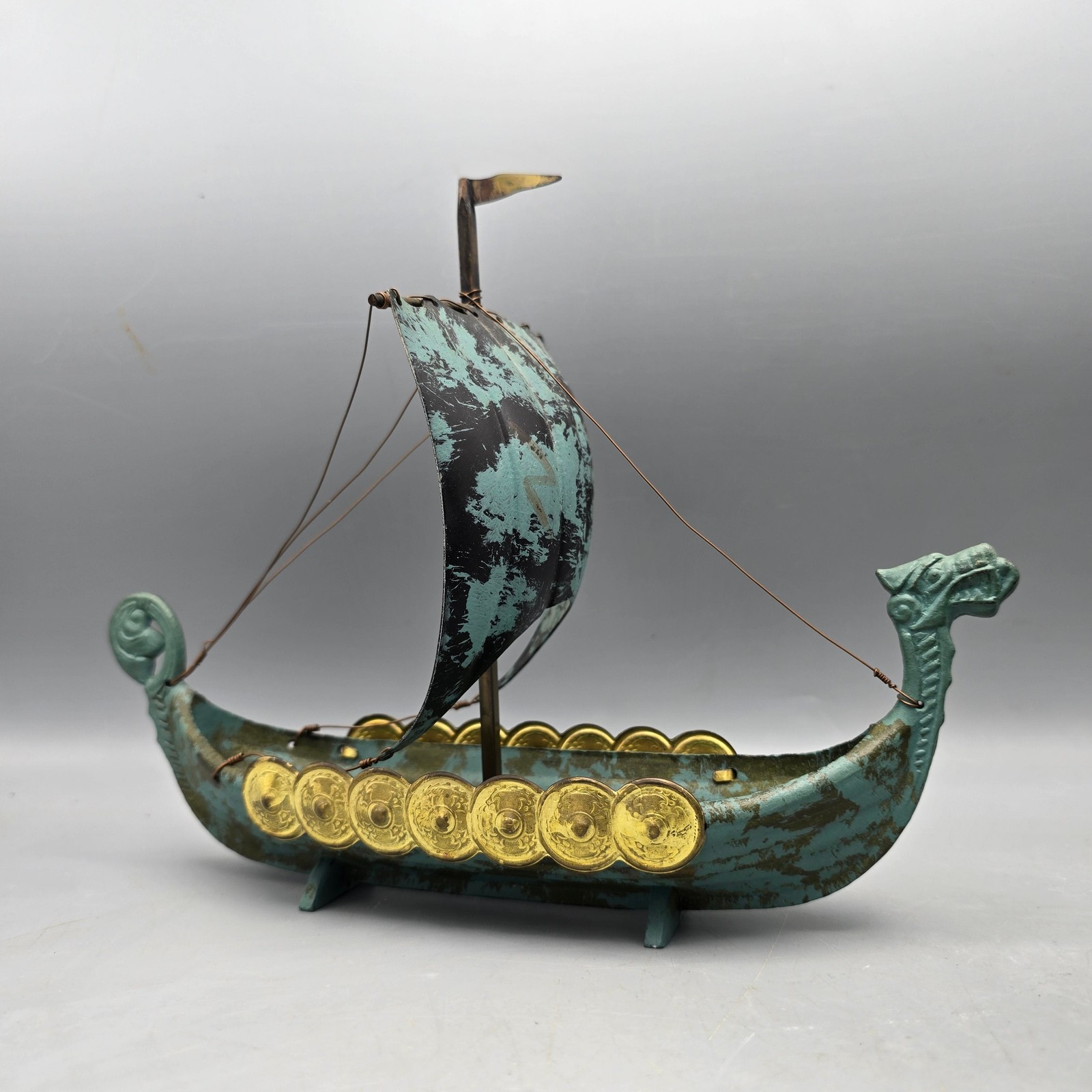 Vintage Bronze Viking Ship with Golden Medallions
