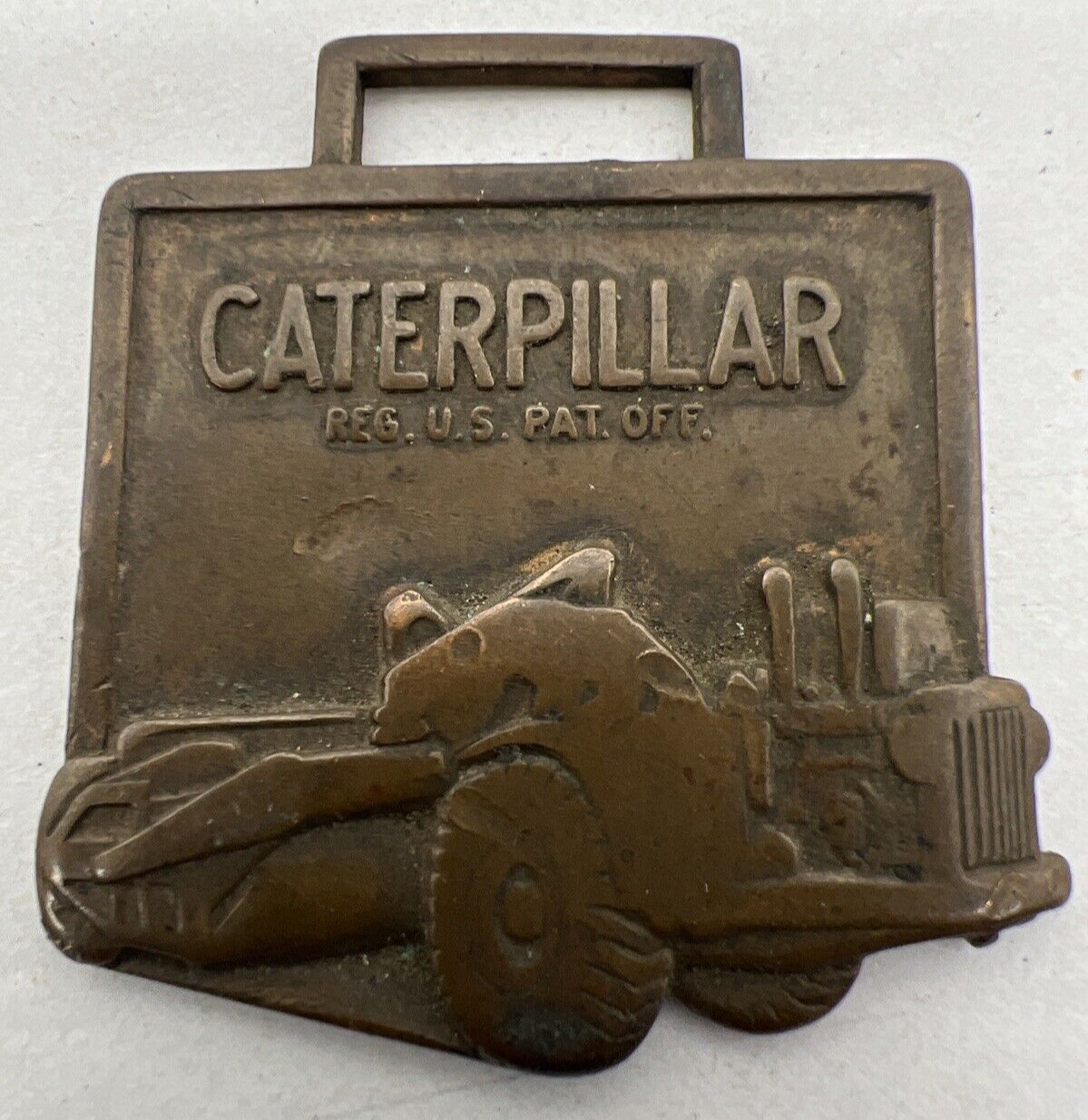 Vintage Caterpillar Tractor Co Watch Fob Great Patina on this one metal Pocket W