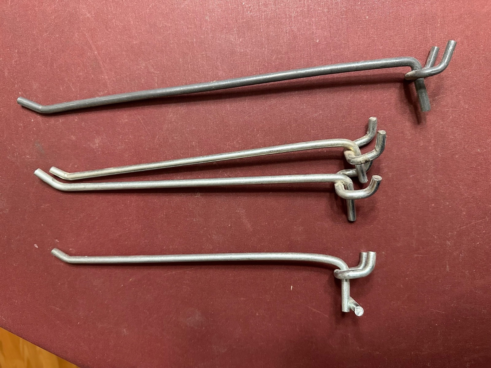 Assorted 3 - 1/4" x 9" And 1 - 1/4" x 11" Steel Single Rod Peg Board Hooks