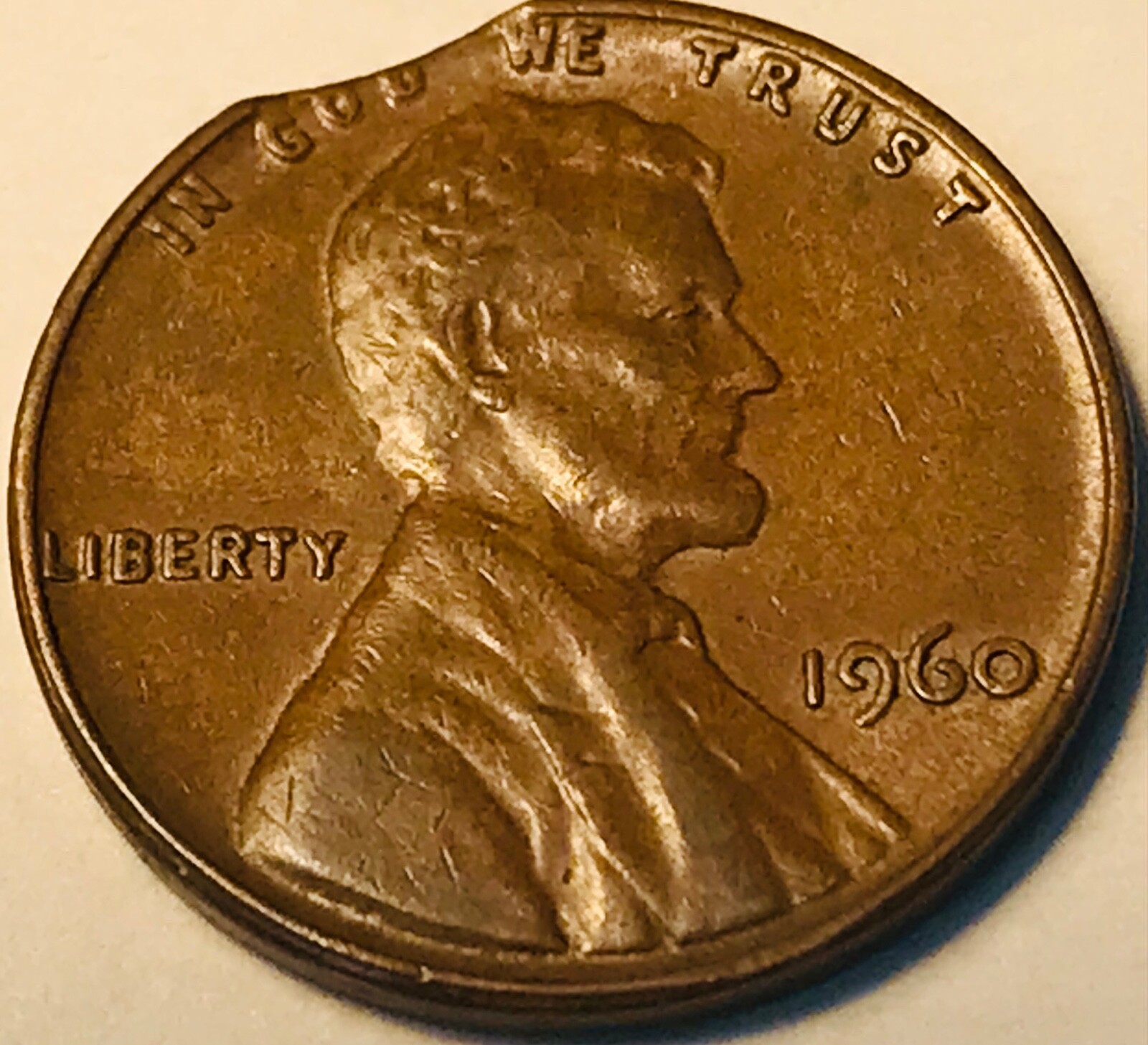 1960 Lincoln cent with curved clip