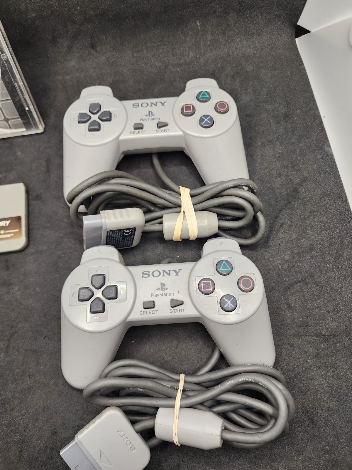 2 Playstation Controllers And 2 Memory Cards