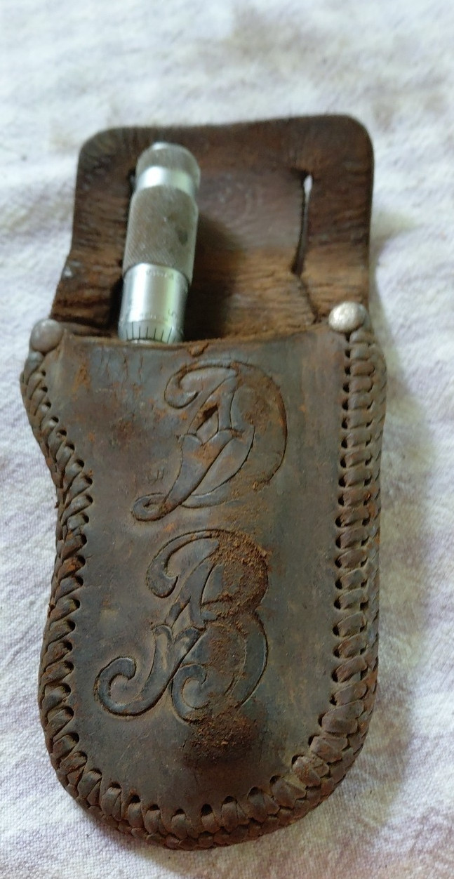 brown sharp micrometer and leather pouch