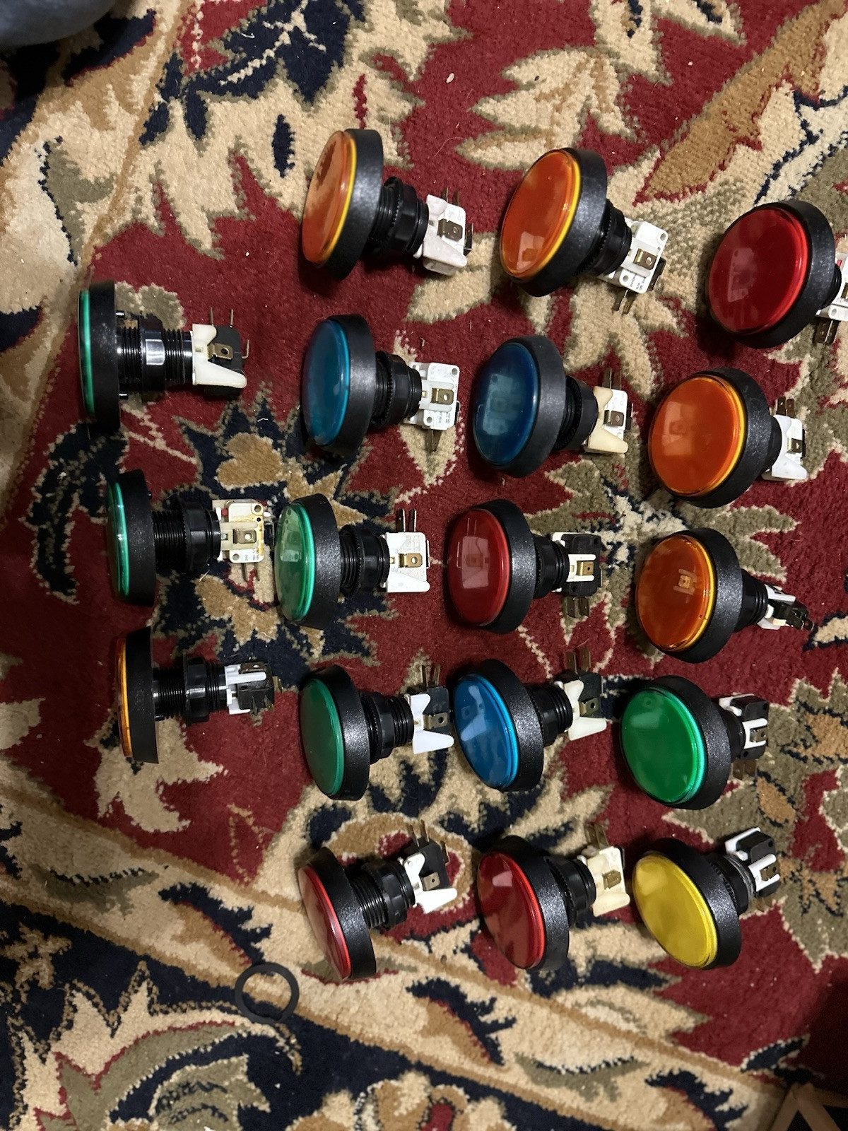 18 Round Push Buttons Complete With Switches In Assorted Colors.