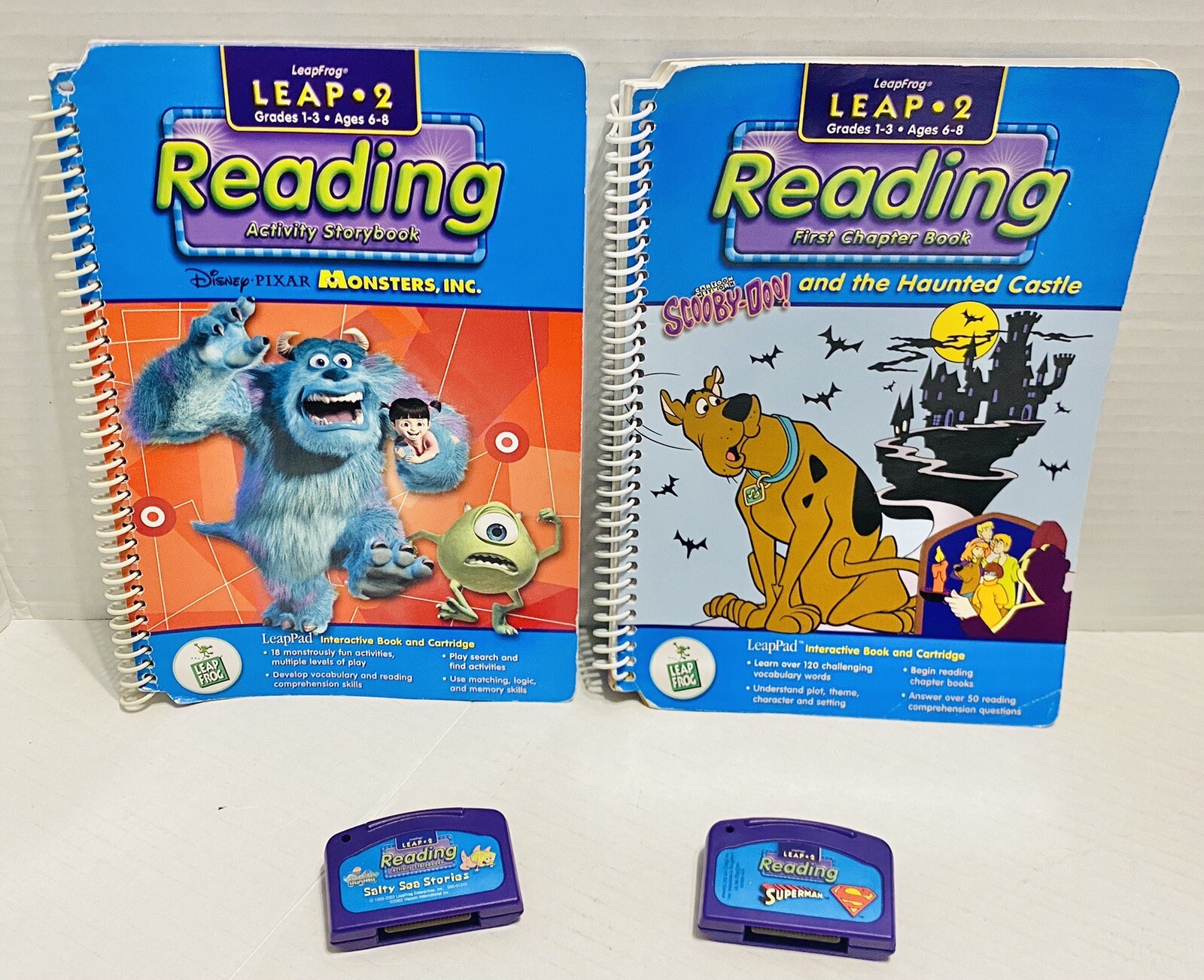 LeapFrog Pad 2 Cartridges Reading SpongeBob/Superman Books Scooby Doo/Monsters
